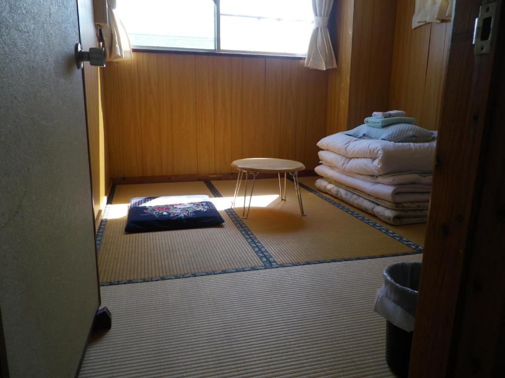 Minshuku Iwakawa Hotel Якушима Стая снимка