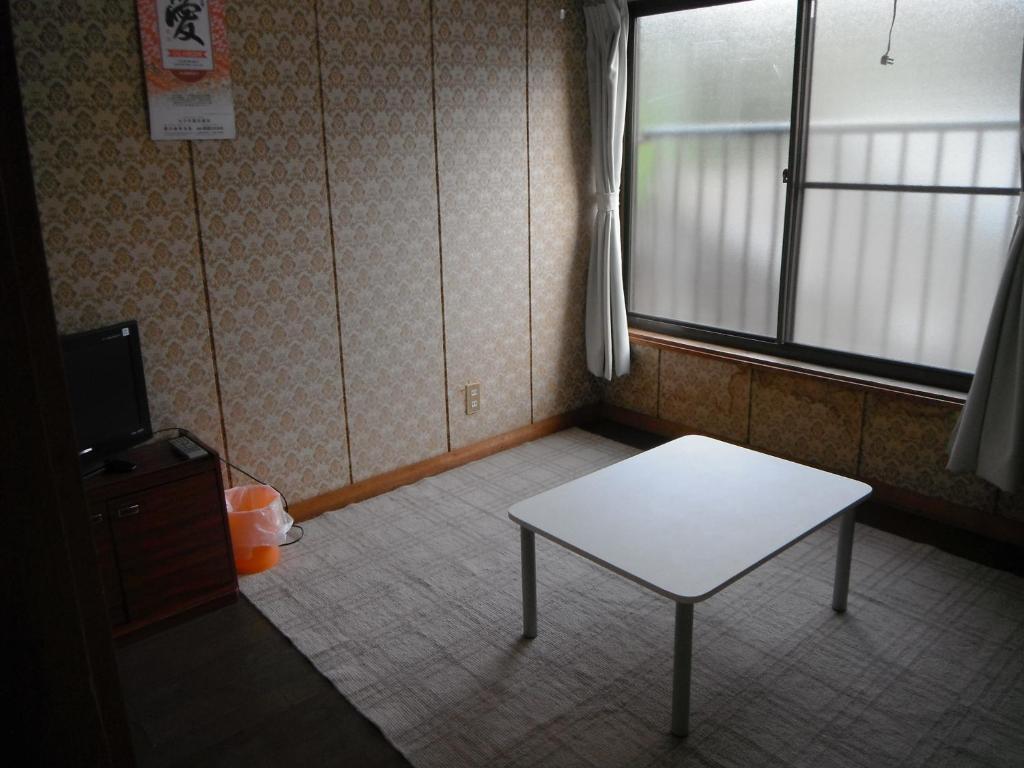 Minshuku Iwakawa Hotel Якушима Стая снимка