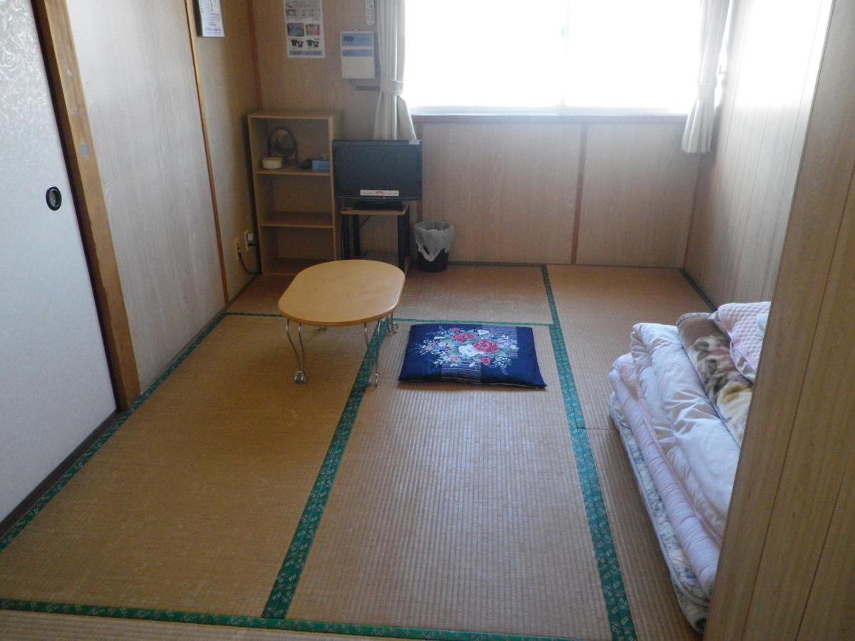 Minshuku Iwakawa Hotel Якушима Стая снимка