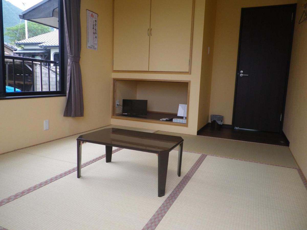 Minshuku Iwakawa Hotel Якушима Екстериор снимка